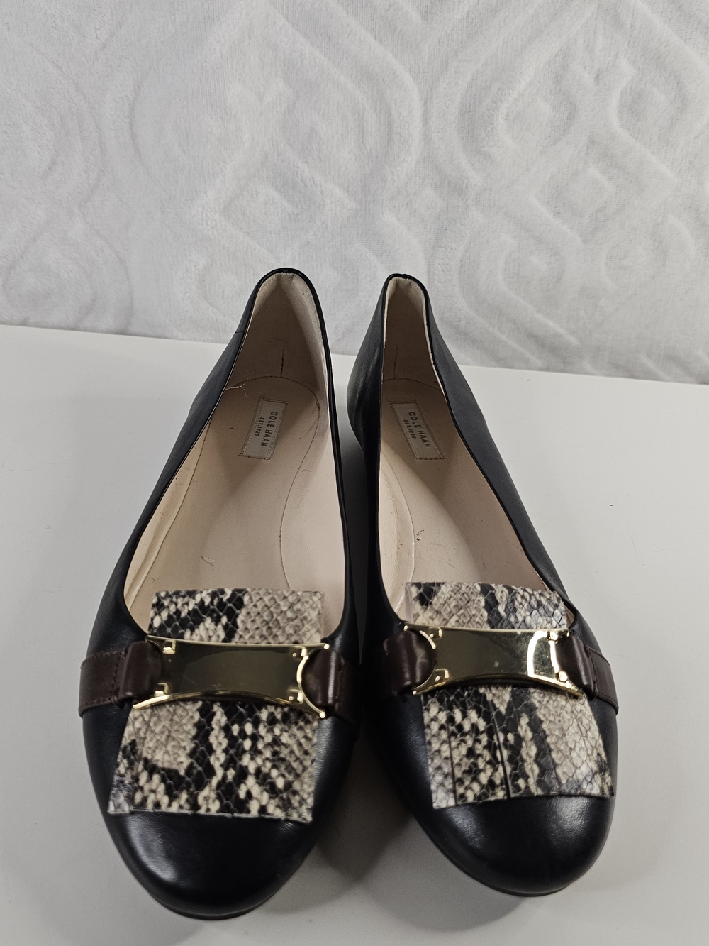 Cole Haan Black Leather Flats with Snake-Print Trim and Gold Accent
